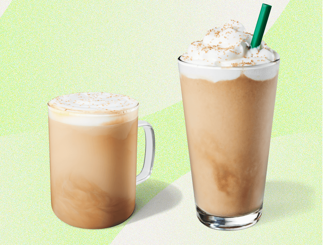 Creamy latte in a glass mug next to a blended coffee beverage in a tall glass with a green straw.