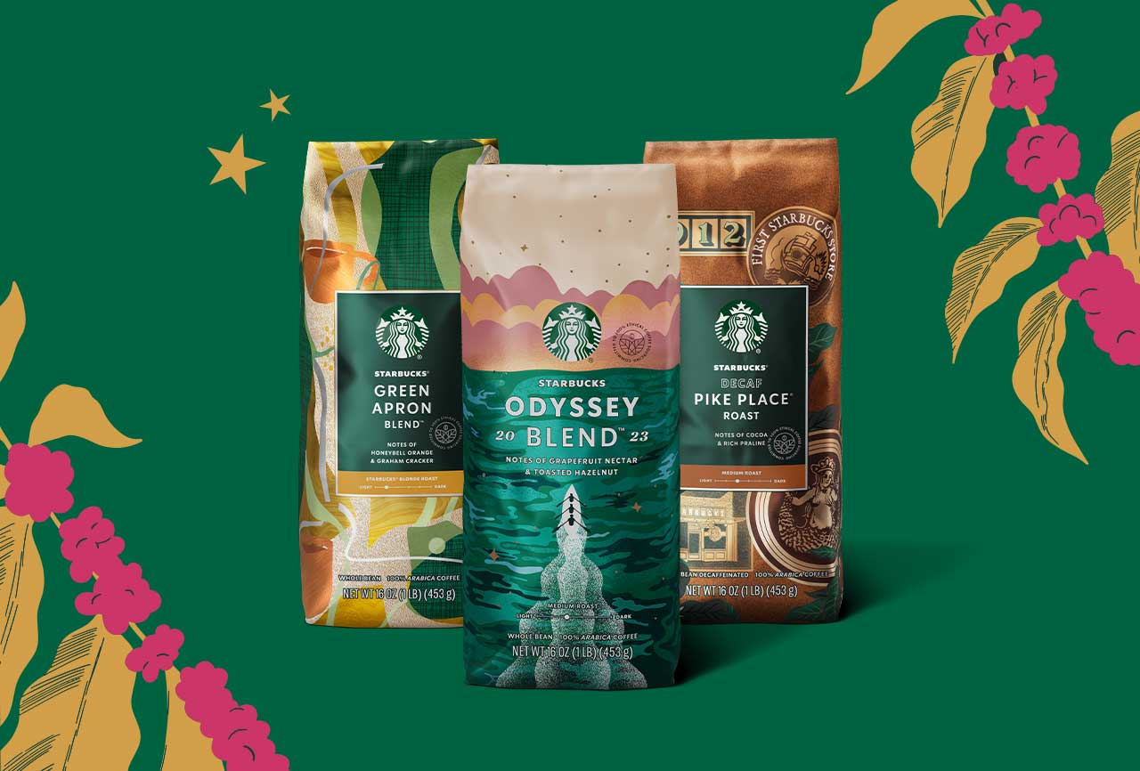 Three bags of Starbucks whole bean coffee surrounded by gold stars.