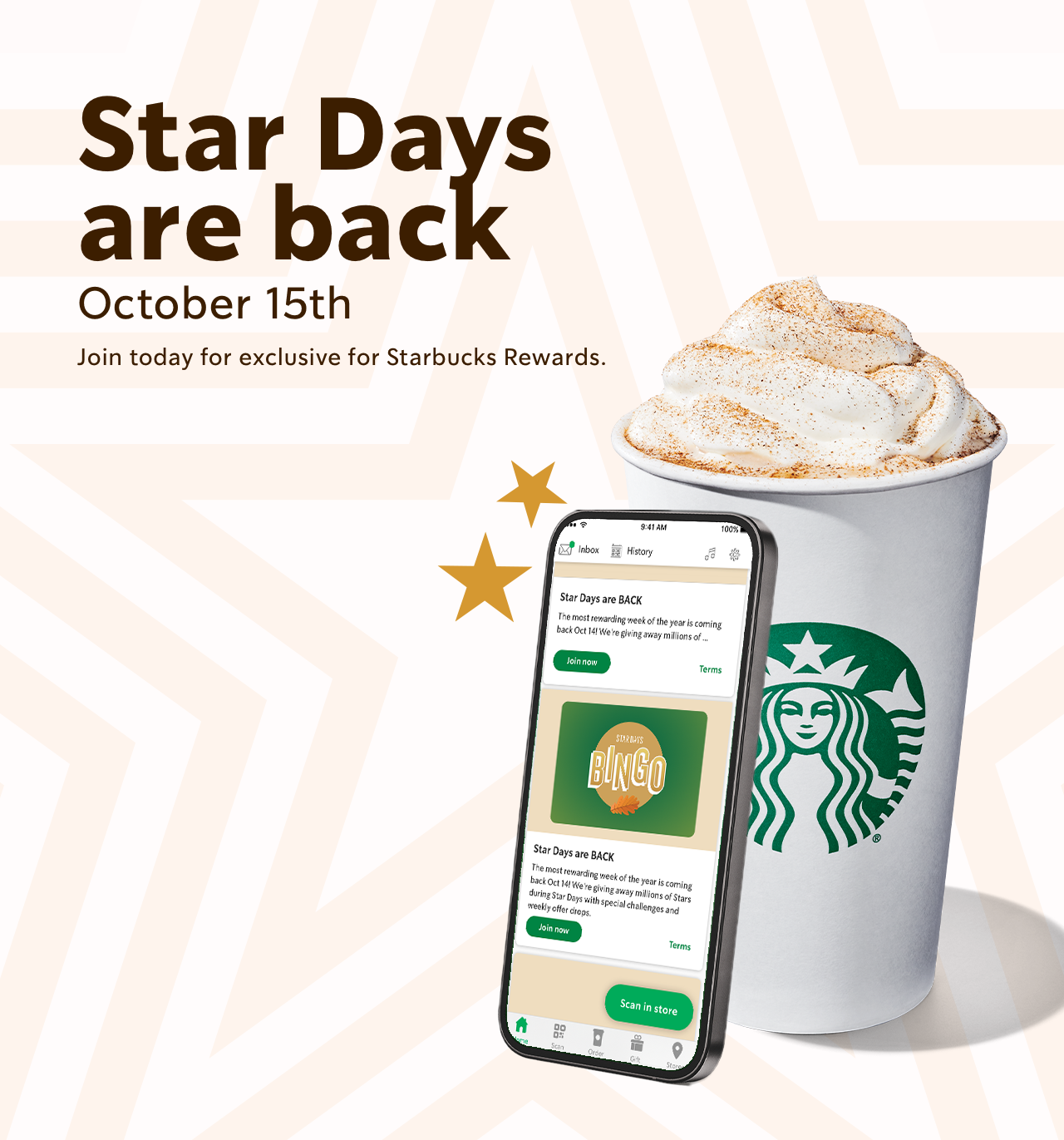A front view of a Coffee with a whipped topping and seasoning in a to go cup with a smartphone leaning against it that has the Starbucks® app open. 