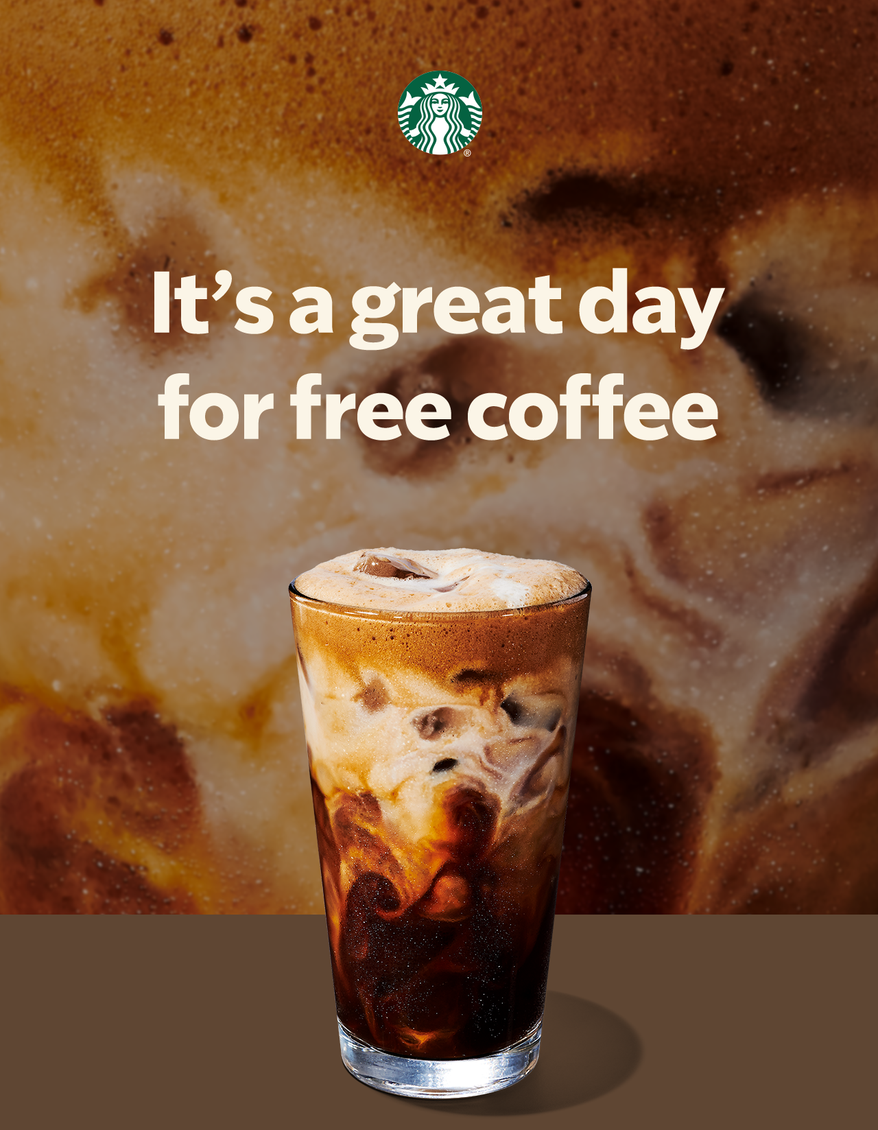 STARBUCKS® | It’s a great day for free coffee | A tall glass of black coffee with cream against a close up shot of coffee and cream.