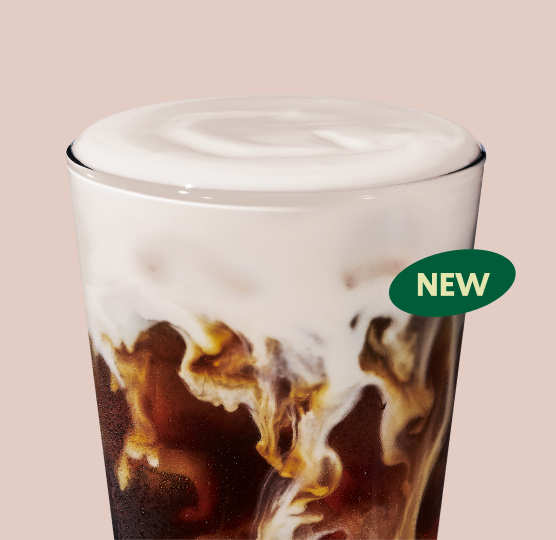 A creamy layer of Brown Sugar Cream Cold Foam on top of Cold Brew in a glass, with an oval graphic that reads: New.